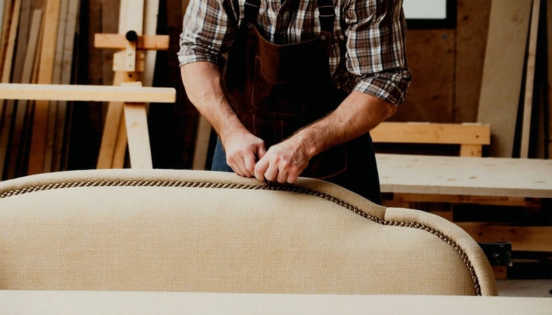 Craftsman working on upholstery